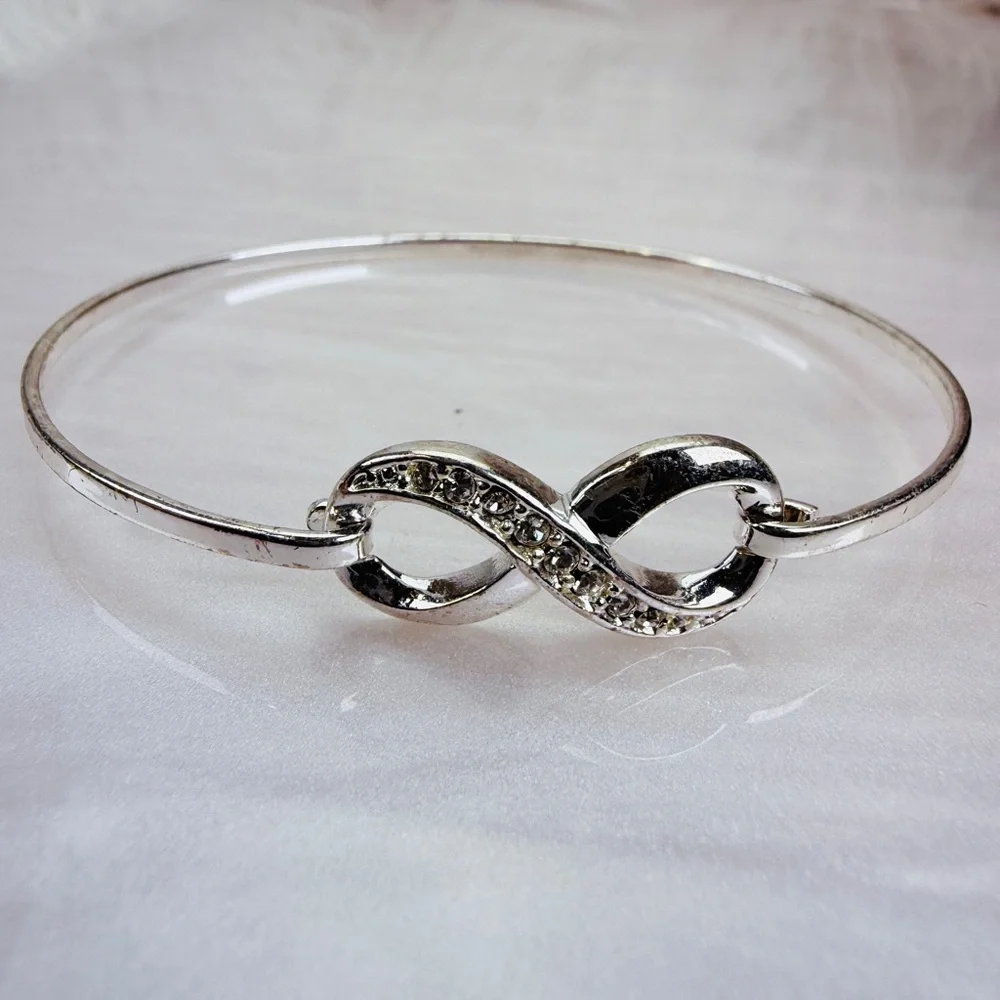 Silvertone bling accent Infinity Bracelet - Picture 11 of 11
